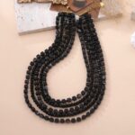 Collier Tressé bleu & pendentifs dorés