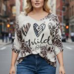 Pull “Wild at Heart” – Imprimé léopard & cœurs patchwork, coupe fluide grande taille