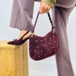 Sac en Cuir de vachette avec clous dorés